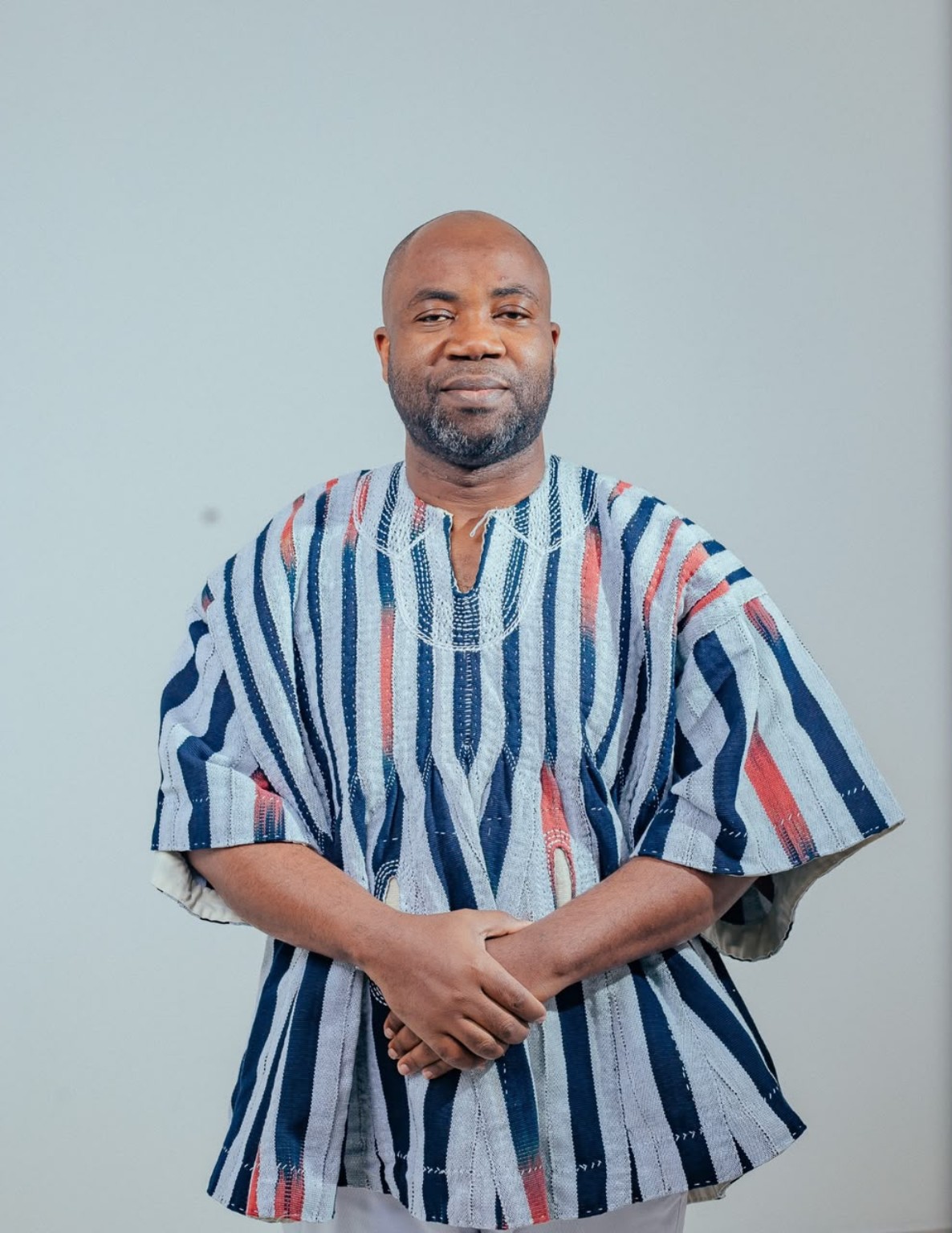 Samson Deen in Ghanaian traditional attire